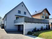 Ansicht Rückseite Terrasse - Freie 2-Zi-ETW mit riesiger Terrasse und Blick ins Grüne