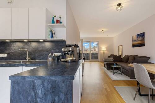 Wohn- / Essbereich - Moderne 2-Zimmer-Wohnung mit Westbalkon, Aufzug und Energieklasse A