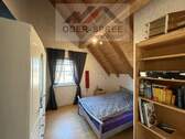 Zimmer im Dachgeschoss - 
