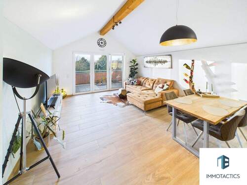 Wohnzimmer - Barrierearme 3-Zimmer-Wohnung mit Loft-Flair, Westbalkon, Aufzug und zwei Stellplätzen in Roxheim