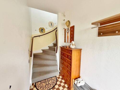 Windfang mit Zugang zur OG-Wohnung - 