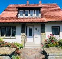 Charmantes Einfamilienhaus mit vielseitigen Nutzungsmöglichkeiten in ruhiger Lage von Werl-Büderich!