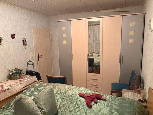 Schlafzimmer Nebengebäude mit Gästewohnung - 