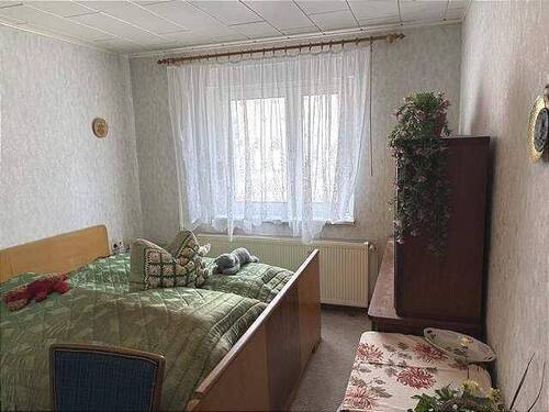 Schlafzimmer Nebengebäude mit Gästewohnung - 