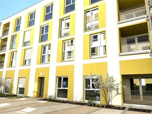 Hausansicht - Loft-Feeling im Erdgeschoss: Stilvolle 2-Zimmer-Wohnung mit Einbauküche