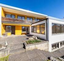 Weitläufiges EFH im Bauhausstil mit Einliegerwohnung, Einzelgarage & traumhaftem Garten in Freising.