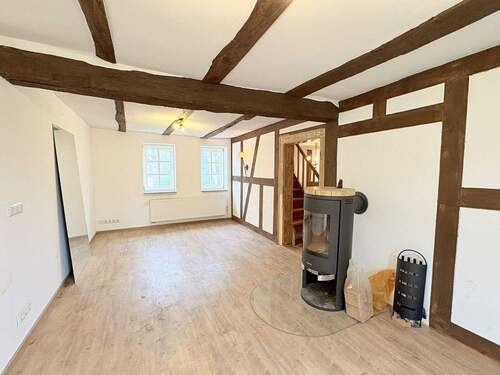 Wohnzimmer (1. OG) - 3 Zimmer Einfamilienhaus zum Kaufen in Stadtallendorf / Schweinsberg