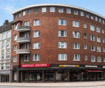 Ansicht außen - 3,5-Zimmer-Wohnung direkt am Winterhuder Markt mit Balkon und Entwicklungspotential