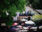 Ansicht mit Biergarten - Hotel, Pension, Gasthof zum Kaufen in Aschau a.Inn-Haselbach