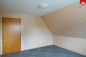 Schlafzimmer im Obergeschoss Bild II - 