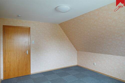 Schlafzimmer im Obergeschoss Bild II - 