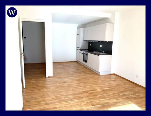Wohnen-Kochen mit EBK - Genießen Sie das Wohnen! Helle 2-Zimmer-Wohnung mit Balkon, Einbauküche, Echtholzparkett, Aufzug