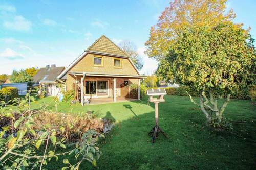Garten mit überdachter Terrasse - 
