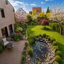 Blick in den Garten frühlingshaft.jpeg - Wohnen und Arbeiten in Zellingen: ein Architekturhighlight mit viel Platz