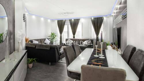 Wohnzimmer 1 - Attraktive Dachgeschosswohnung mit 2 Balkonen, TG und guter Anbindung in Möckern