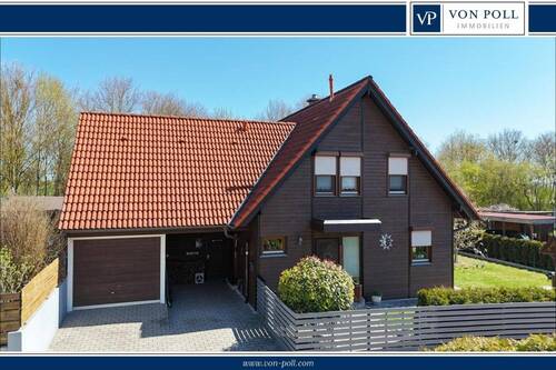 Titelbild - Großzügiges Einfamilienhaus mit idyllischem Garten, sonnigen Terrassen und hohem Wohnkomfort