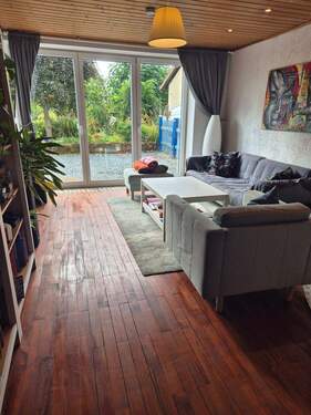 Wohnzimmer mit Zugang zu Terrasse u. Garten - 8 Zimmer Bauernhaus, Landhaus zum Kaufen in Merzig