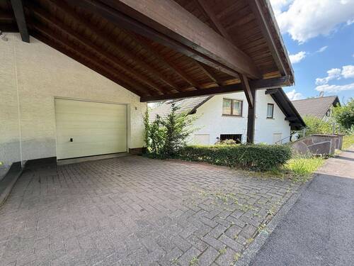 Garage mit Carport - 