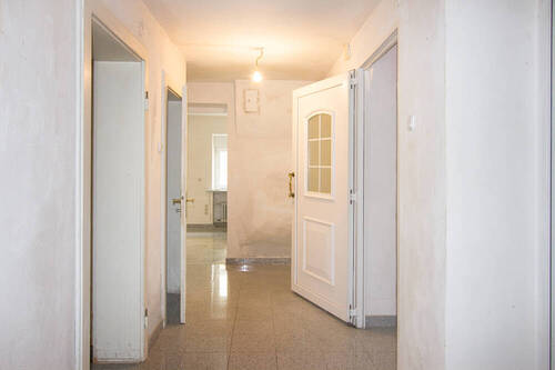 EG Flur Blick zu GE1 Sozialraum - 