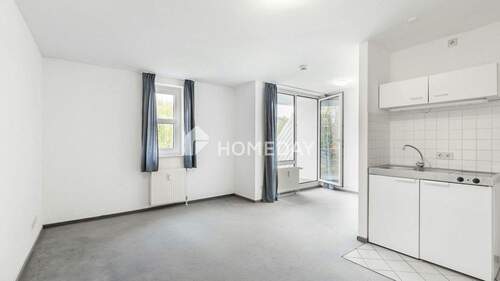 Wohnzimmer 1 - 1 Zimmer Etagenwohnung zum Kaufen in Hannover