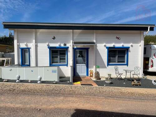 Haus Front - Wo der Blick zur Ruhe kommt - Ihr Zuhause direkt am Schwarzrindersee mit Seezugang