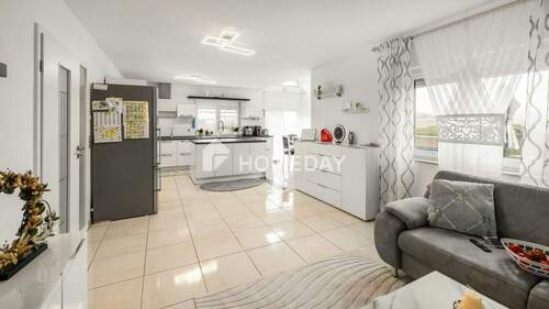 EG Wohnzimmer 1 - Ruhig gelegenes Einfamilienhaus mit Energieeffizienzklasse A und viel Platz für die ganze Familie