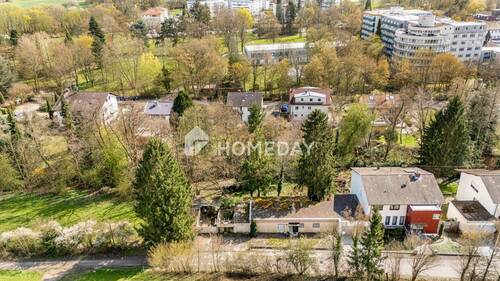 Außenansicht Drohne 5 - Baugrund, mit Bungalow und Blick in die Zukunft: Ihr Freiraum für Familie, Ideen oder Neubauvisionen