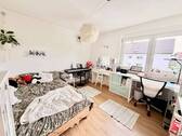 Gemütliches Schlafzimmer - 3 Zimmer Etagenwohnung zum Kaufen in Riegel am Kaiserstuhl