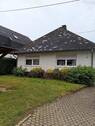 Außenansicht - Charmantes Einfamilienhaus mit großem Garten, Wintergarten, Terrasse, Garage und modernisiertem Bad