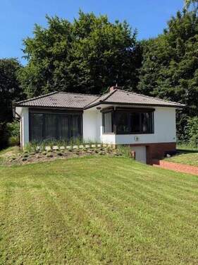Südseite - Provisionsfrei vom Eigentümer: Renovierter Bungalow in Parklage auf 702 m² Endgrundstück