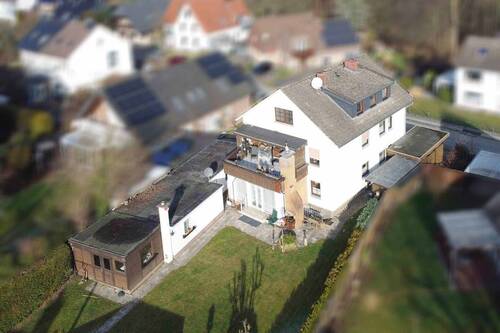 Ansicht Garten - Investieren vor den Toren Bielefelds: Mehrfamilienhaus mit 3 vermieteten Wohneinheiten