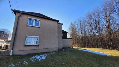 seitliche Gebäudeansicht - Einfamilienhaus mit 180,00 m&sup2; in Auerbach zum Kaufen