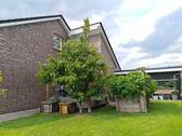Seitenansicht - 3 Zimmer Mehrfamilienhaus, Wohnhaus in Ovelgönne