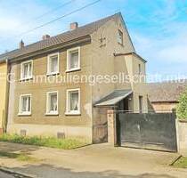 Doppelhaushälfte mit Nebengelass, großem Grundstück und viel Potenzial in Meinsdorf - Dessau-Roßlau