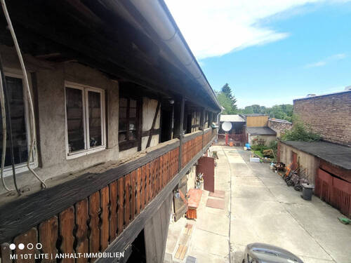 Nebengelass Balkon (4) - 1 Zimmer Mehrfamilienhaus, Wohnhaus in Raguhn-Jeßnitz