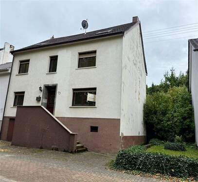 Hausfront - 1 Zimmer Mehrfamilienhaus, Wohnhaus zum Kaufen in Wadgassen
