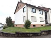 Ansicht - Vermietetes Zweifamilienhaus mit Garten und Garage in 66787 WadgassenDifferten zu verkaufen