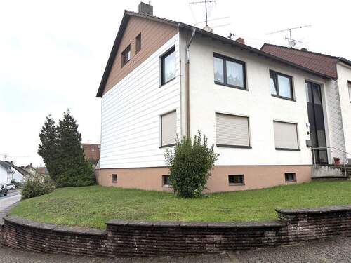 Ansicht - Vermietetes Zweifamilienhaus mit Garten und Garage in 66787 WadgassenDifferten zu verkaufen