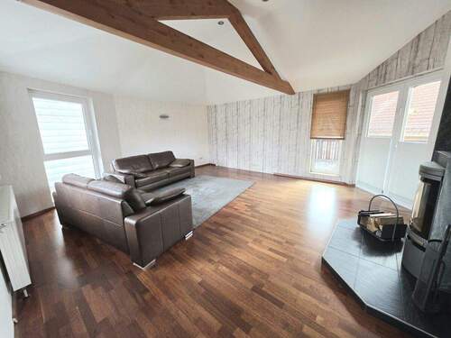 Wohnzimmer mit Kaminofen OG - 