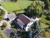 Haus- und Grundstücksansicht - Mehrfamilienhaus, Wohnhaus mit 412,00 m² in Gager zum Kaufen