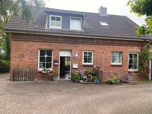 Rückansicht Wohnhaus - Mehrfamilienhaus, Wohnhaus mit 150,00 m² in Itzehoe zum Kaufen