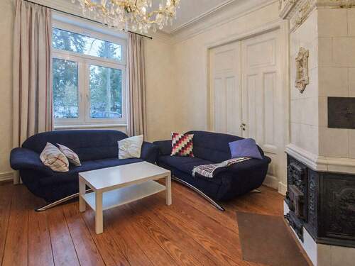 Wohnzimmer EG-Wohnung - Mehrfamilienhaus, Wohnhaus mit 115,00 m&sup2; in Itzehoe zum Kaufen