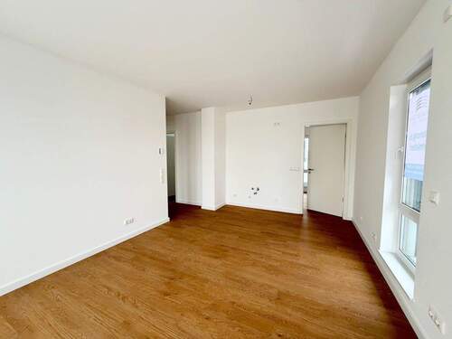 Wohnzimmer mit offener Küche - 