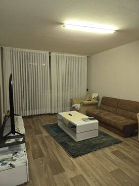 Wohnzimmer - Charmante 3-Zimmer-Wohnung in zentraler Lage