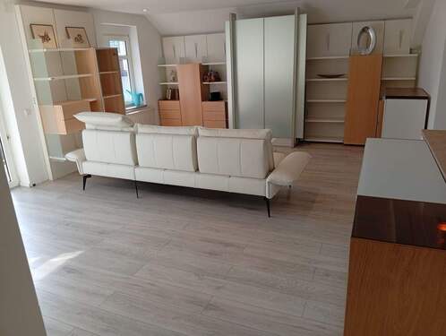 Wohnzimmer im OG mit Wohnwand - 