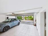 Garage mit Hauszugang - Einfamilienhaus mit 210,00 m² in Nieder-Olm zum Kaufen