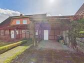 Ansicht mit Carport - 
