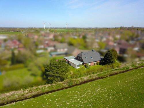 Luftaufnahme - Einfamilienhaus mit 155,00 m² in Südbrookmerland / Uthwerdum zur Miete