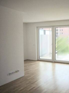 Wohnzimmer - Exklusive 2-Zimmer-Erdgeschoss-Wohnung in Harlaching