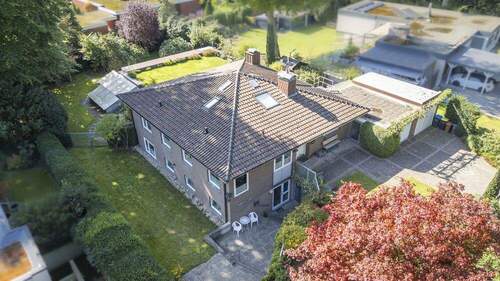 Seitenansicht Souterrainwohnung - Achitektenhaus mit Einliegerwohnung, Garage und Schwimmbad in top Wohnlage in Ems- und Waldnähe!